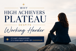 Contemplative leadership over distant mountains - Intuitive Leadership® Powered by SHIFTology® - Intuitive Leadership® Powered by SHIFTology® Professional leadership-themed blog banner featuring a businesswoman seated on a mountaintop overlook, facing a distant horizon at sunrise. The graphic includes the headline “Why High Achievers Plateau Despite Working Harder” in elegant navy and gold typography. A highlighted message reads, “It’s not your effort. It’s your next level of leadership.” The design conveys reflection, growth, leadership development, strategic thinking, and personal transformation.